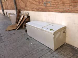 Fridge freezer laying in the street